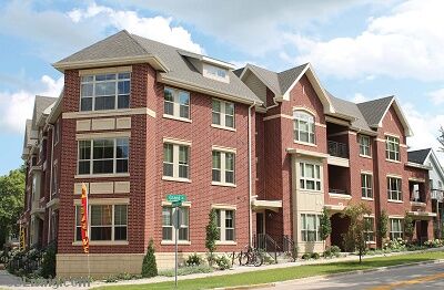 Kingston Corners brick apartment building on a street corner